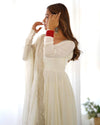 Divine Off White Colored Heavy Roman Silk Chanderi Anarkali Gown