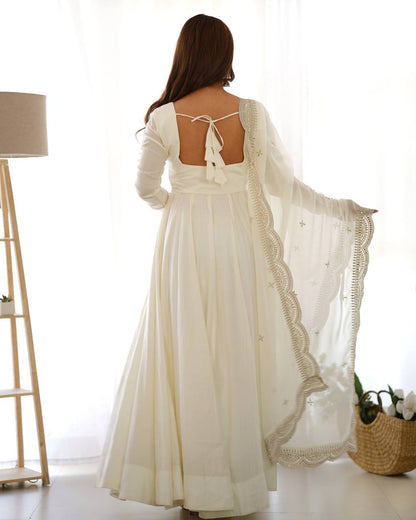 Divine Off White Colored Heavy Roman Silk Chanderi Anarkali Gown